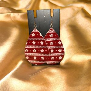 Handmade leather holiday earrings.